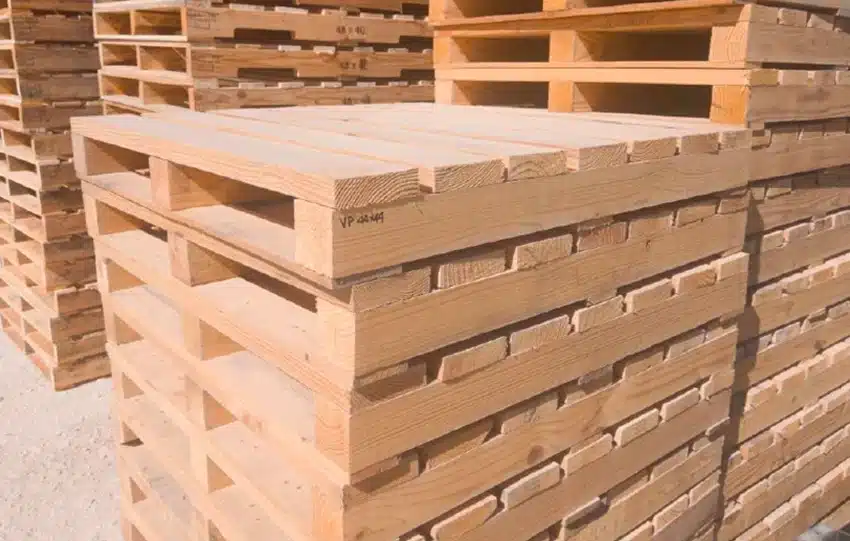 custom-built-wood-pallets with small markings on the pallets for sorting.